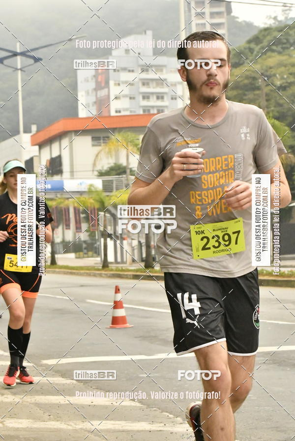Buy your photos of the eventMeia Maratona de Blumenau on Fotop