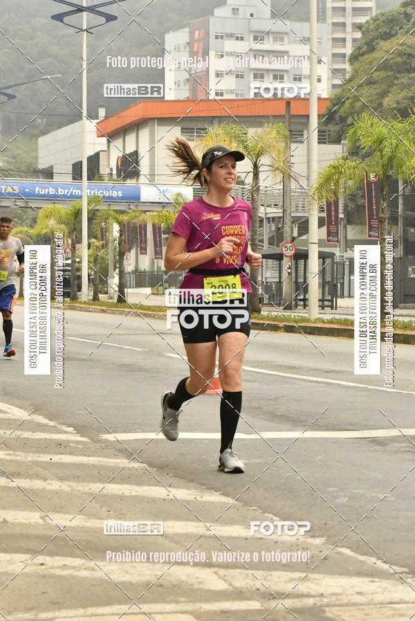 Buy your photos of the eventMeia Maratona de Blumenau on Fotop