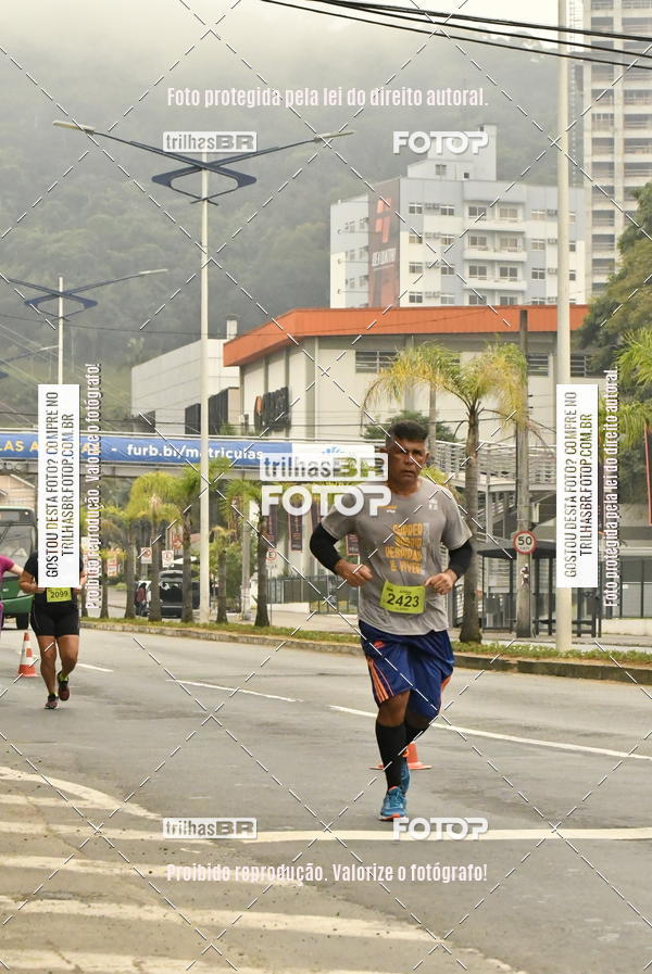 Buy your photos of the eventMeia Maratona de Blumenau on Fotop