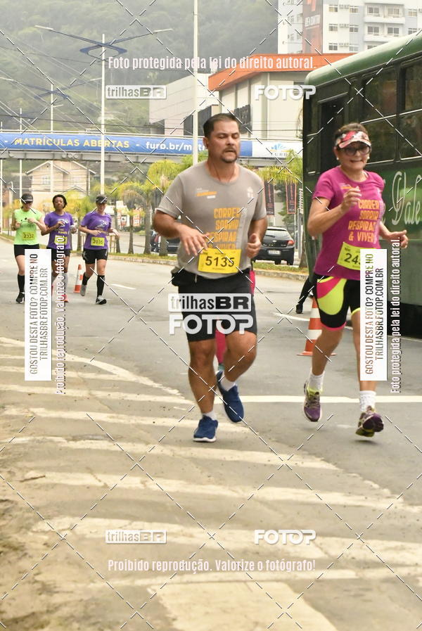 Buy your photos of the eventMeia Maratona de Blumenau on Fotop