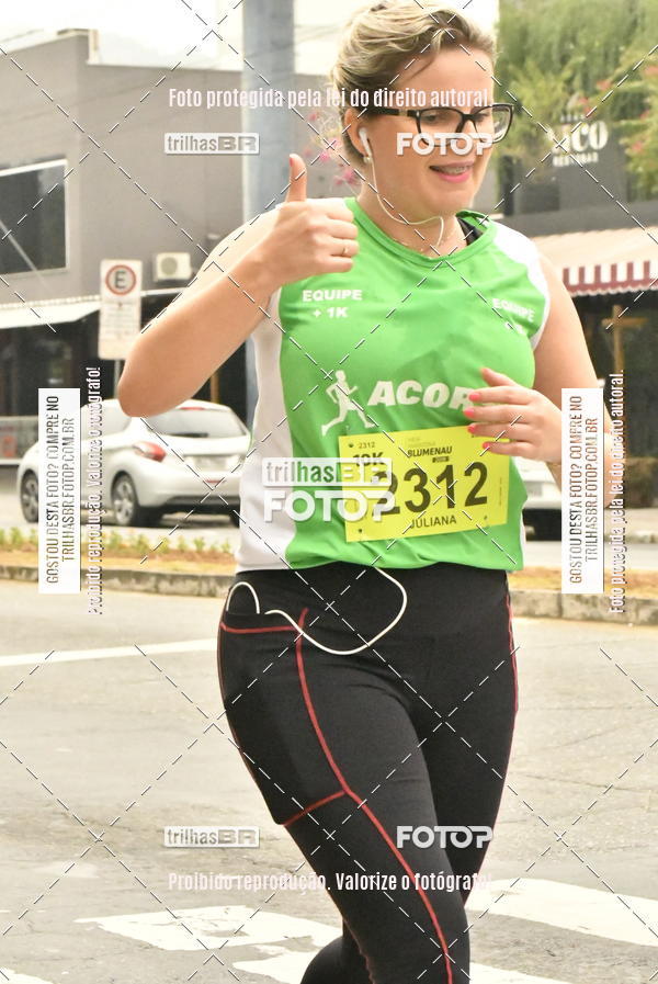 Buy your photos of the eventMeia Maratona de Blumenau on Fotop