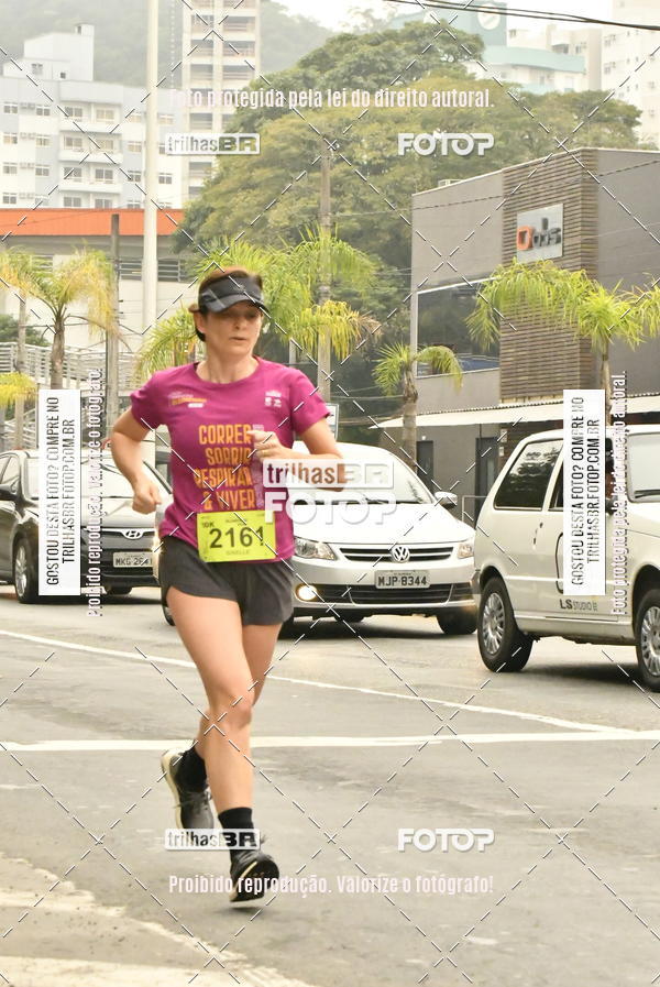 Buy your photos of the eventMeia Maratona de Blumenau on Fotop