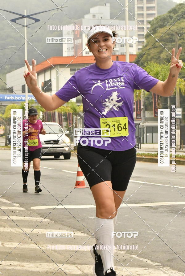 Buy your photos of the eventMeia Maratona de Blumenau on Fotop