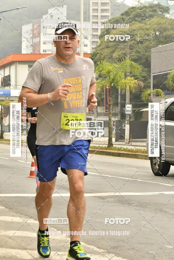 Buy your photos of the eventMeia Maratona de Blumenau on Fotop