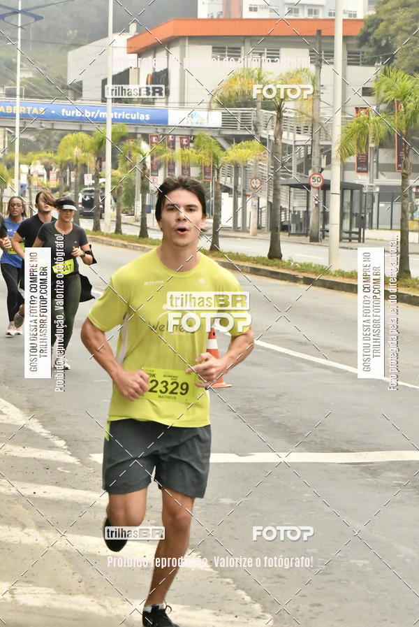 Buy your photos of the eventMeia Maratona de Blumenau on Fotop