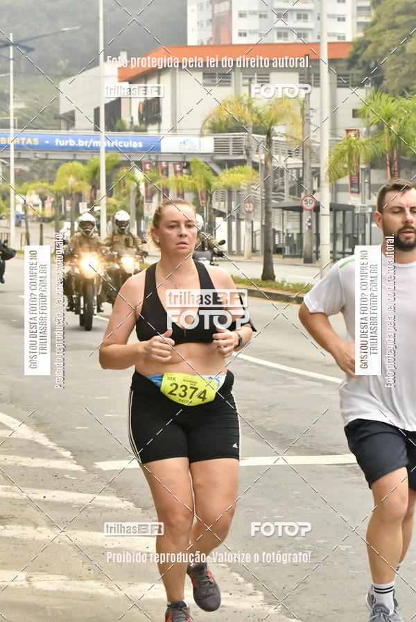 Buy your photos of the eventMeia Maratona de Blumenau on Fotop