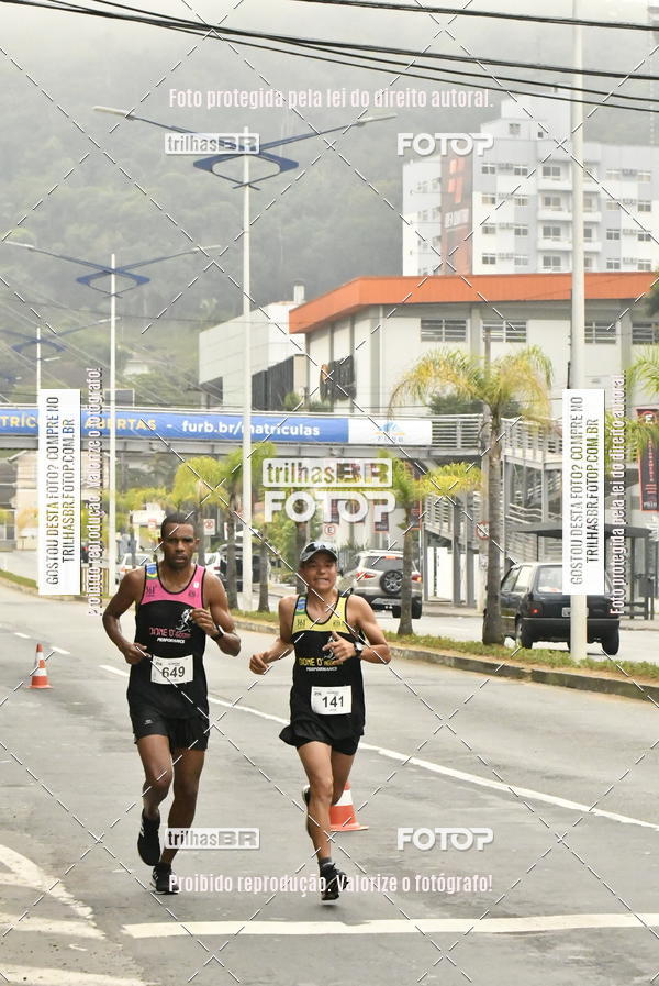Buy your photos of the eventMeia Maratona de Blumenau on Fotop
