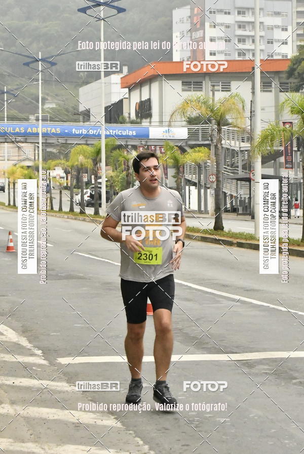 Buy your photos of the eventMeia Maratona de Blumenau on Fotop