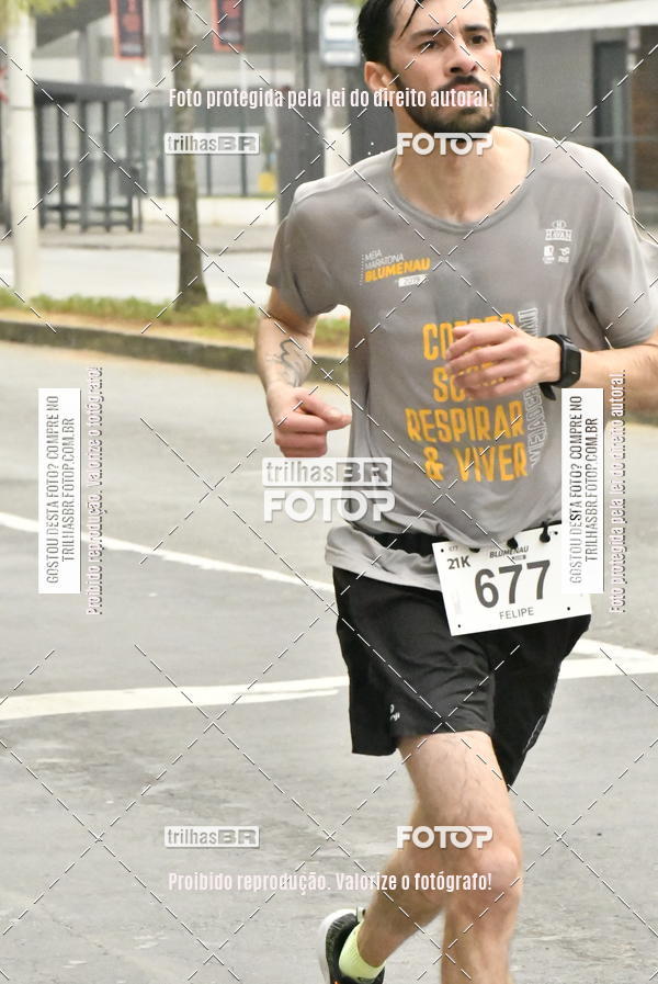 Buy your photos of the eventMeia Maratona de Blumenau on Fotop