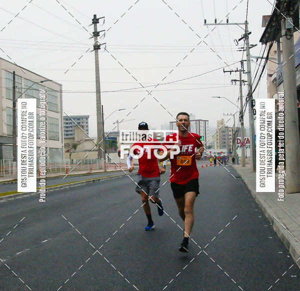 Buy your photos of the eventMeia Maratona de Blumenau on Fotop