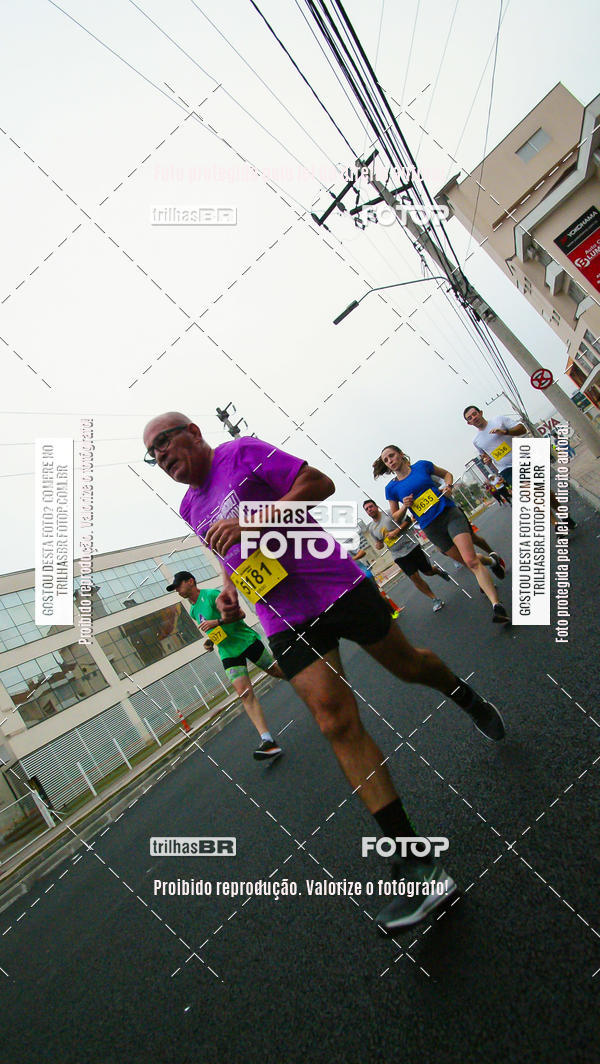 Buy your photos of the eventMeia Maratona de Blumenau on Fotop