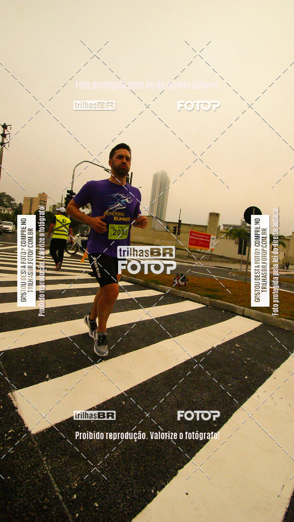 Buy your photos of the eventMeia Maratona de Blumenau on Fotop