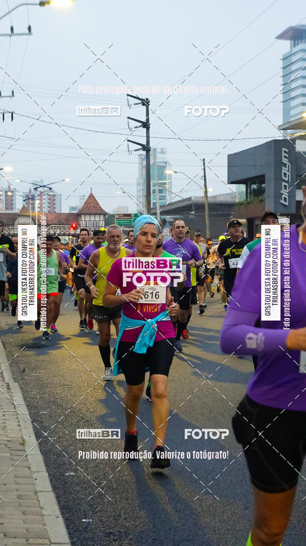 Buy your photos of the eventMeia Maratona de Blumenau on Fotop