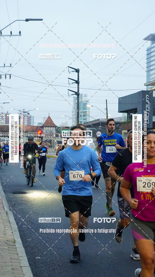 Buy your photos of the eventMeia Maratona de Blumenau on Fotop