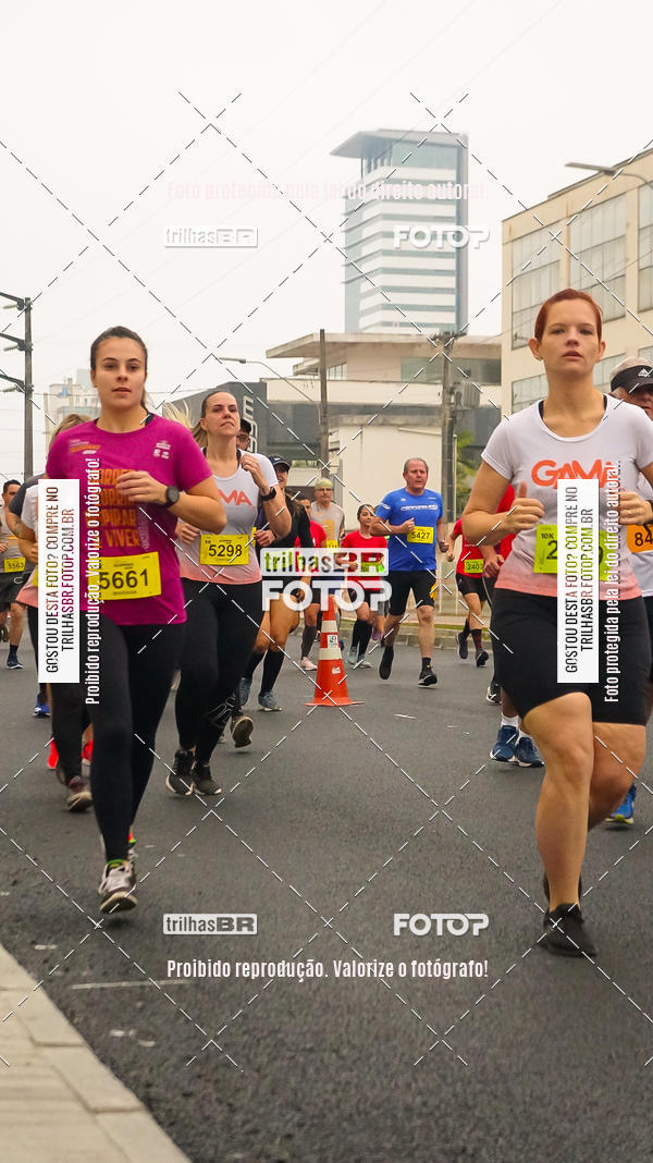 Buy your photos of the eventMeia Maratona de Blumenau on Fotop