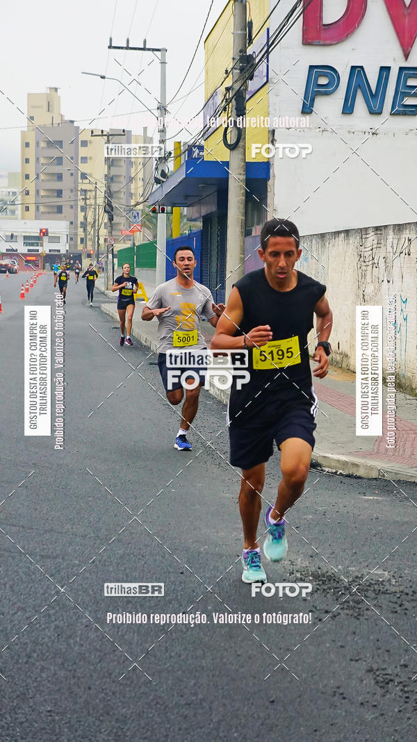 Buy your photos of the eventMeia Maratona de Blumenau on Fotop