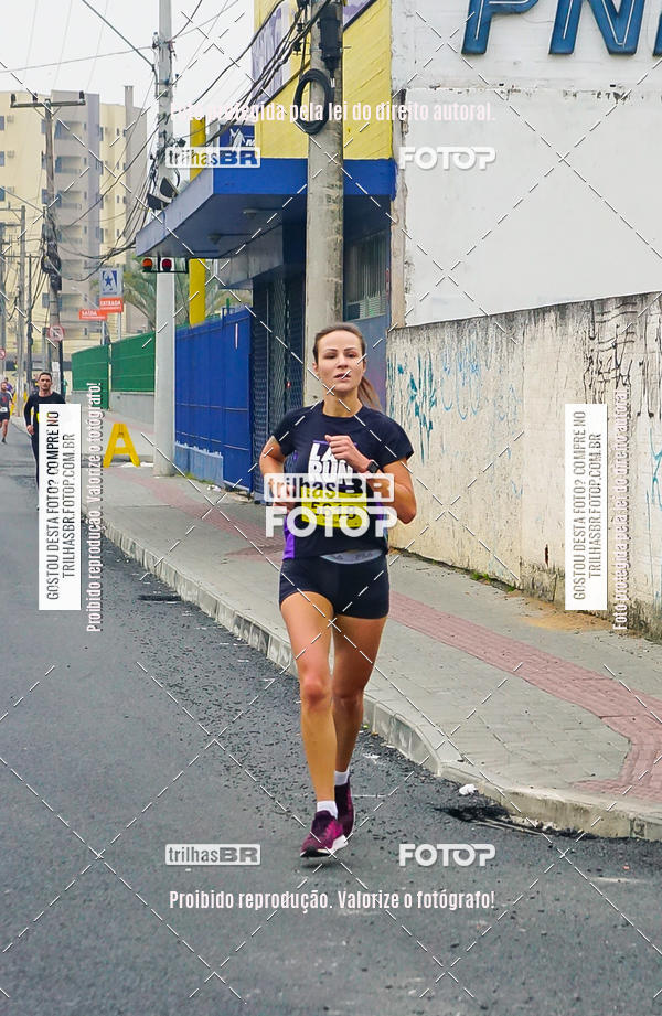 Buy your photos of the eventMeia Maratona de Blumenau on Fotop