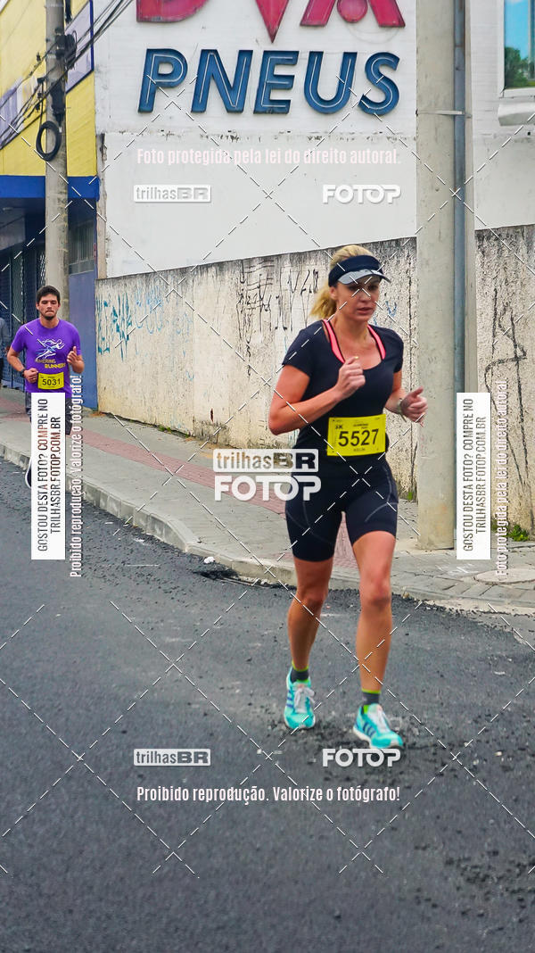 Buy your photos of the eventMeia Maratona de Blumenau on Fotop
