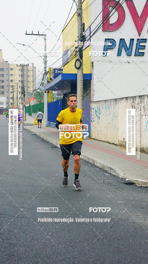 Buy your photos of the eventMeia Maratona de Blumenau on Fotop