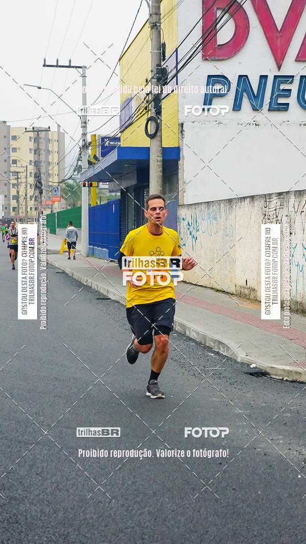 Buy your photos of the eventMeia Maratona de Blumenau on Fotop