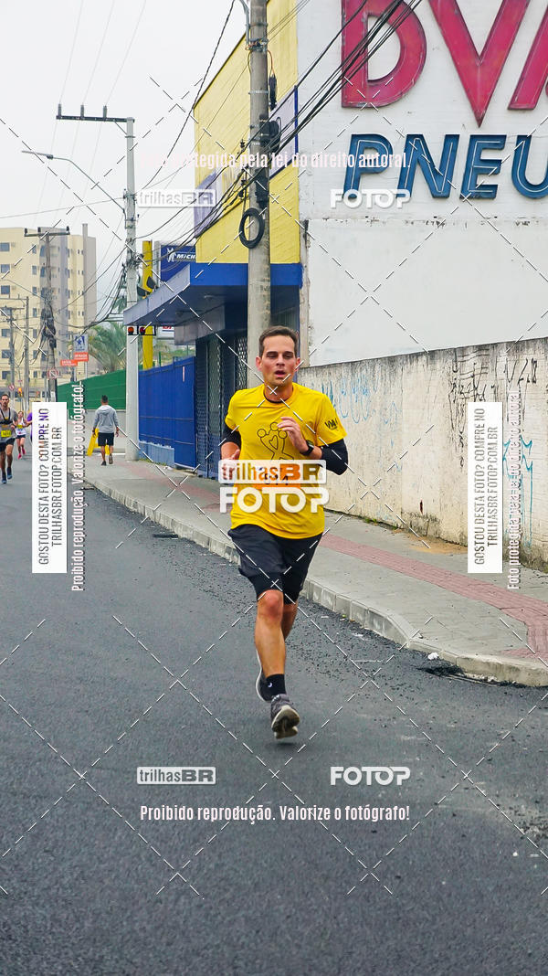 Buy your photos of the eventMeia Maratona de Blumenau on Fotop