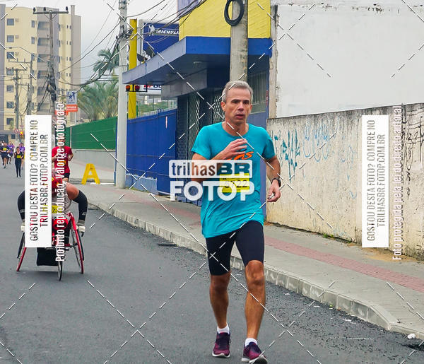 Buy your photos of the eventMeia Maratona de Blumenau on Fotop