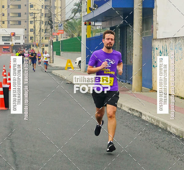 Buy your photos of the eventMeia Maratona de Blumenau on Fotop