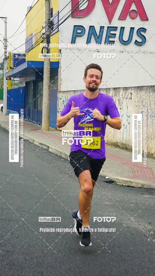 Buy your photos of the eventMeia Maratona de Blumenau on Fotop