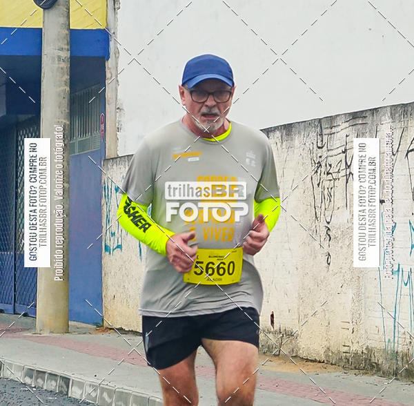 Buy your photos of the eventMeia Maratona de Blumenau on Fotop