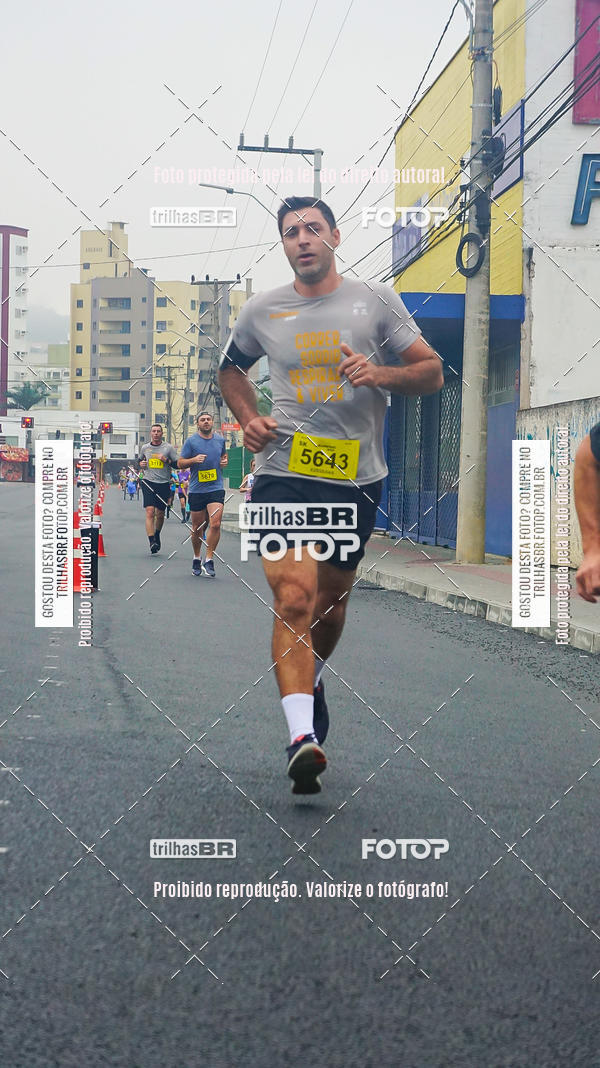 Buy your photos of the eventMeia Maratona de Blumenau on Fotop