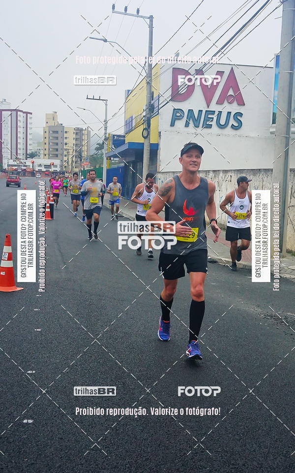 Buy your photos of the eventMeia Maratona de Blumenau on Fotop