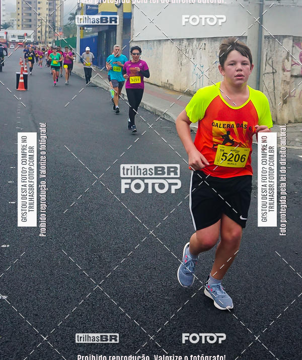 Buy your photos of the eventMeia Maratona de Blumenau on Fotop