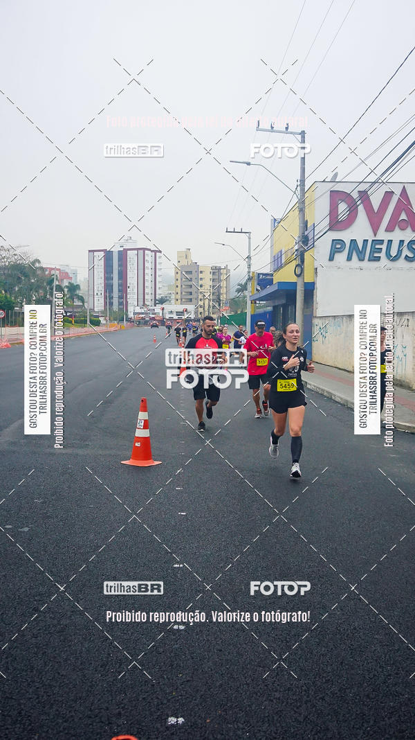 Buy your photos of the eventMeia Maratona de Blumenau on Fotop