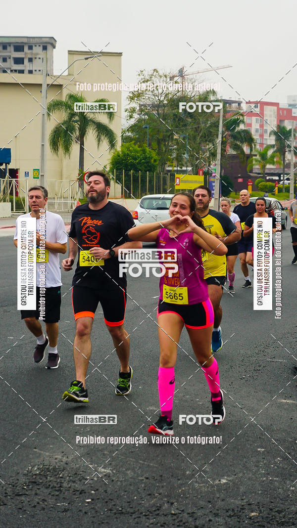 Buy your photos of the eventMeia Maratona de Blumenau on Fotop