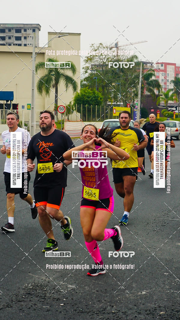 Buy your photos of the eventMeia Maratona de Blumenau on Fotop