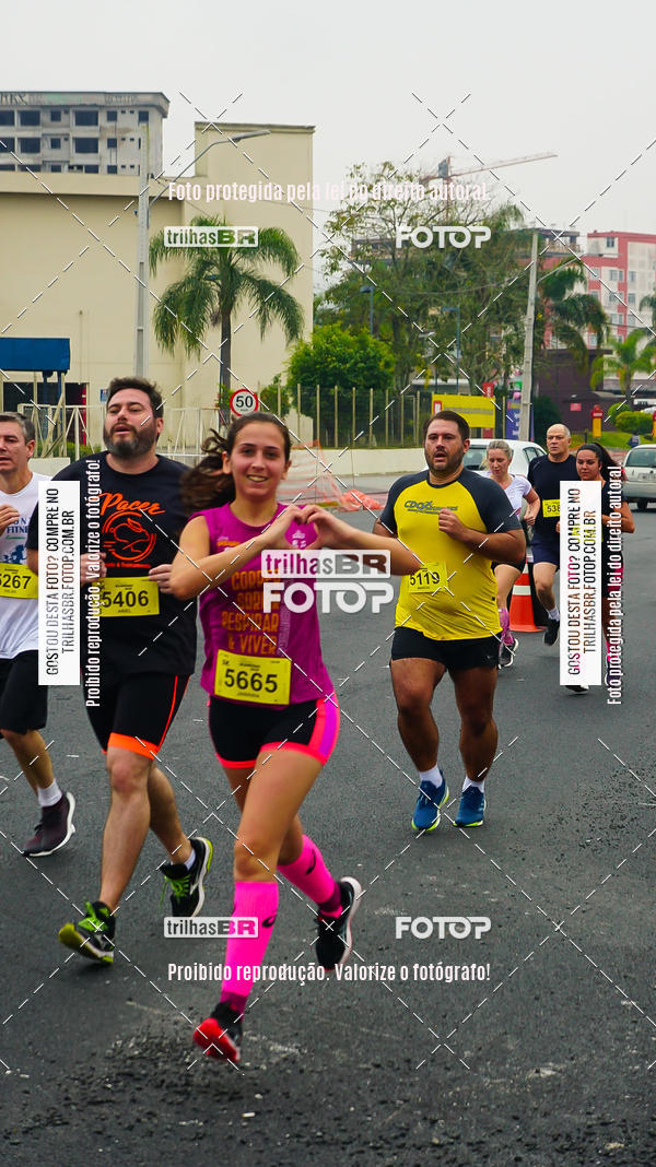 Buy your photos of the eventMeia Maratona de Blumenau on Fotop