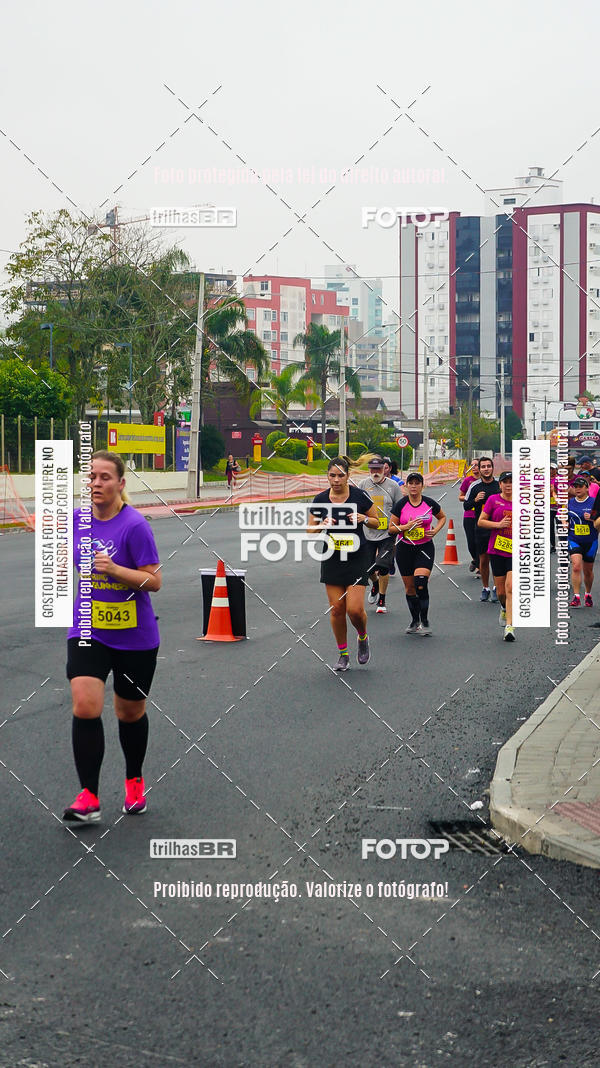Buy your photos of the eventMeia Maratona de Blumenau on Fotop