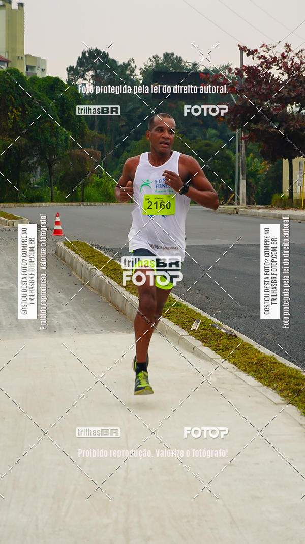 Buy your photos of the eventMeia Maratona de Blumenau on Fotop