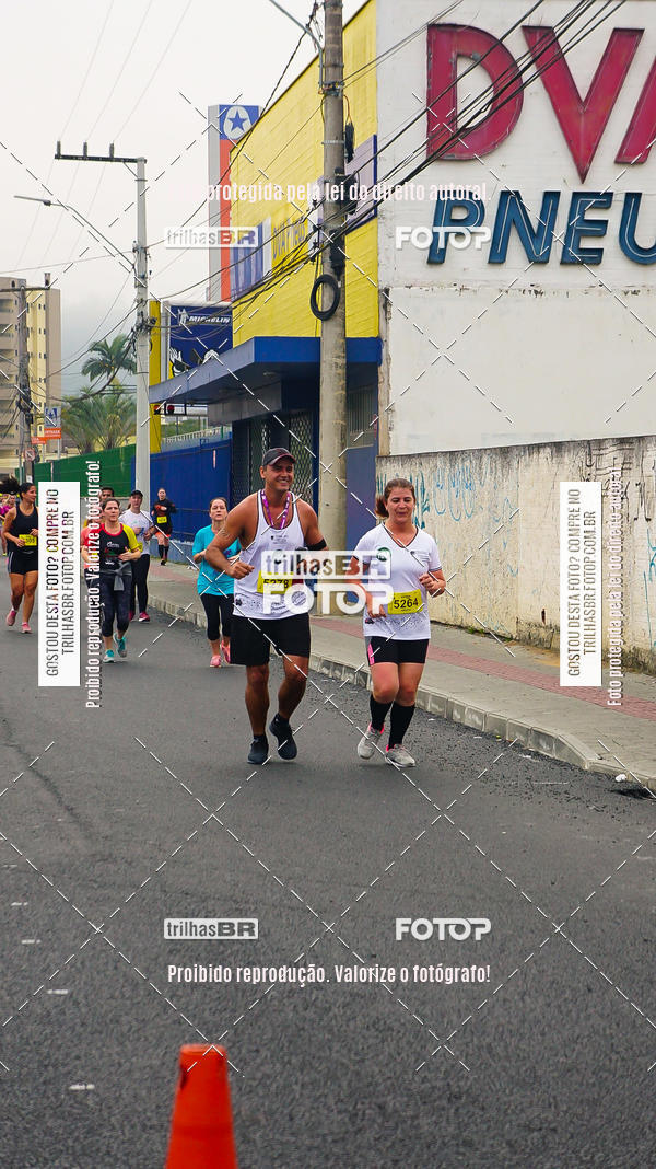 Buy your photos of the eventMeia Maratona de Blumenau on Fotop