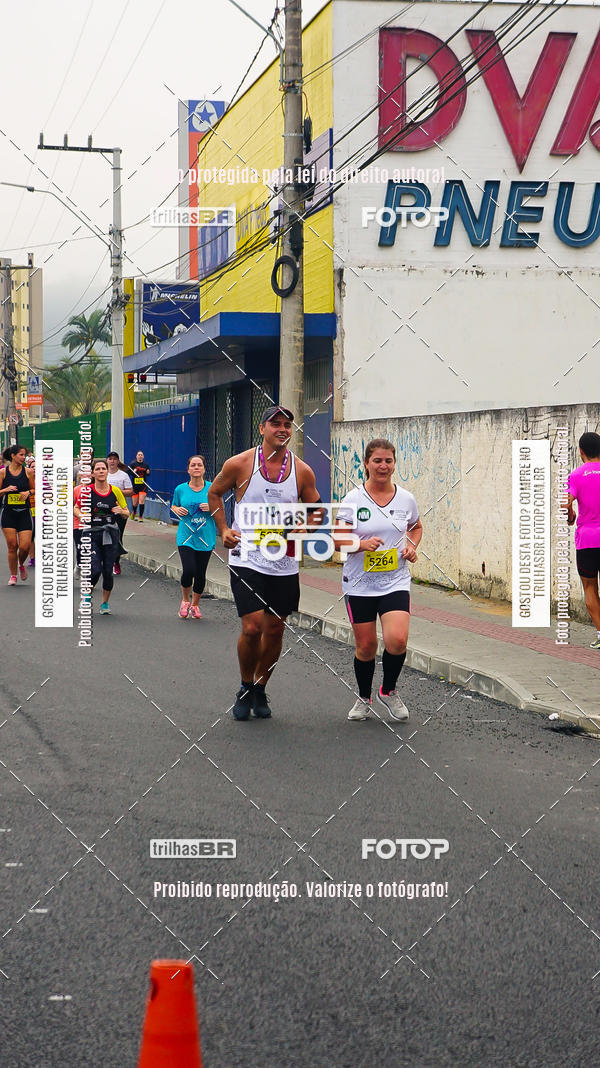 Buy your photos of the eventMeia Maratona de Blumenau on Fotop