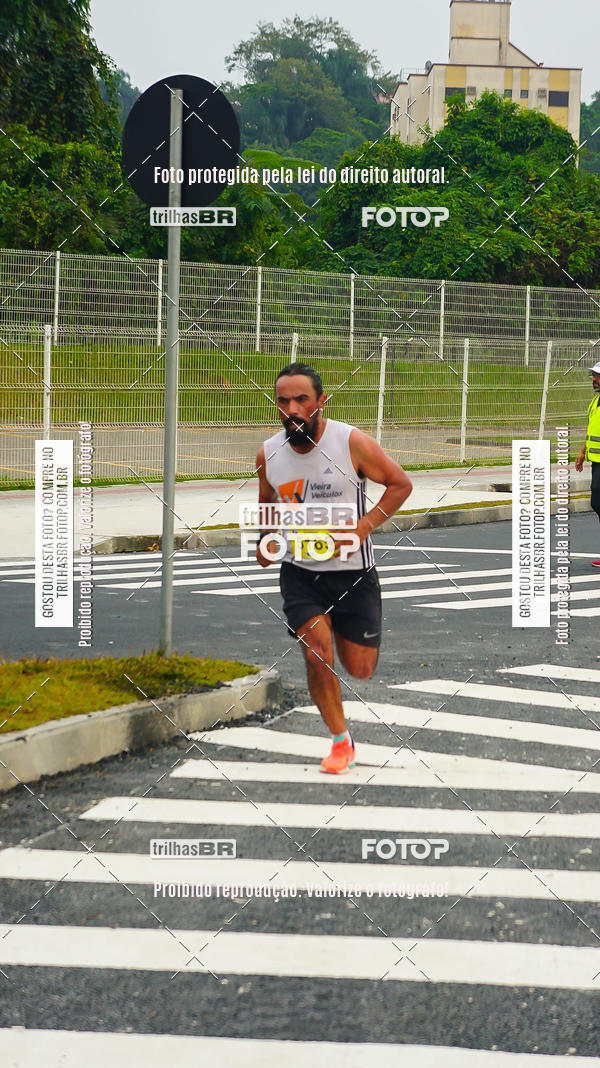 Buy your photos of the eventMeia Maratona de Blumenau on Fotop