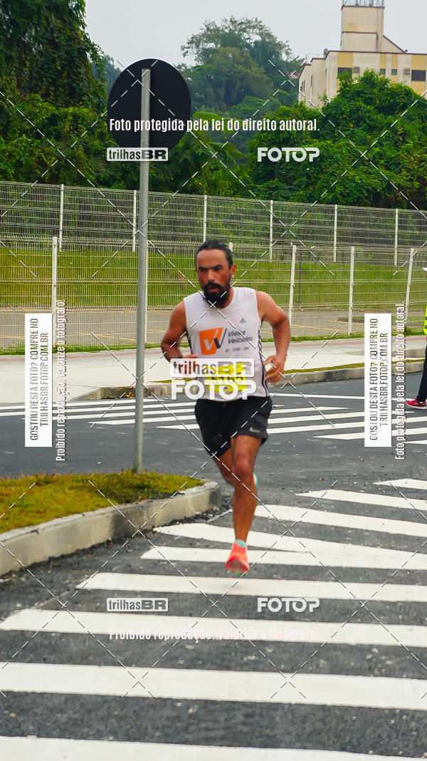 Buy your photos of the eventMeia Maratona de Blumenau on Fotop