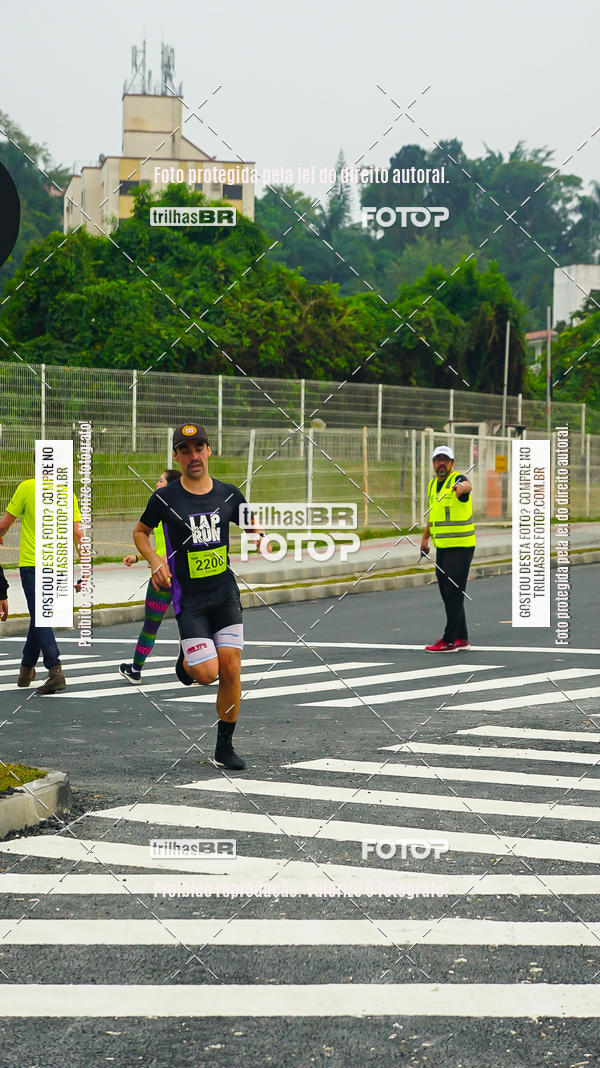 Buy your photos of the eventMeia Maratona de Blumenau on Fotop