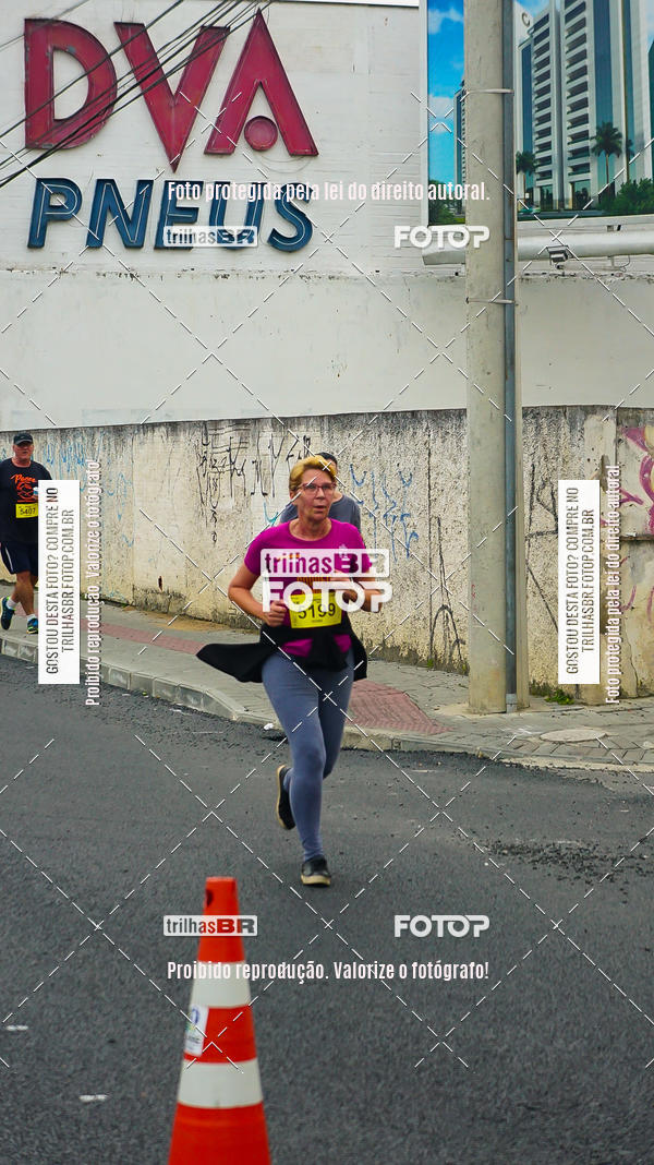 Buy your photos of the eventMeia Maratona de Blumenau on Fotop