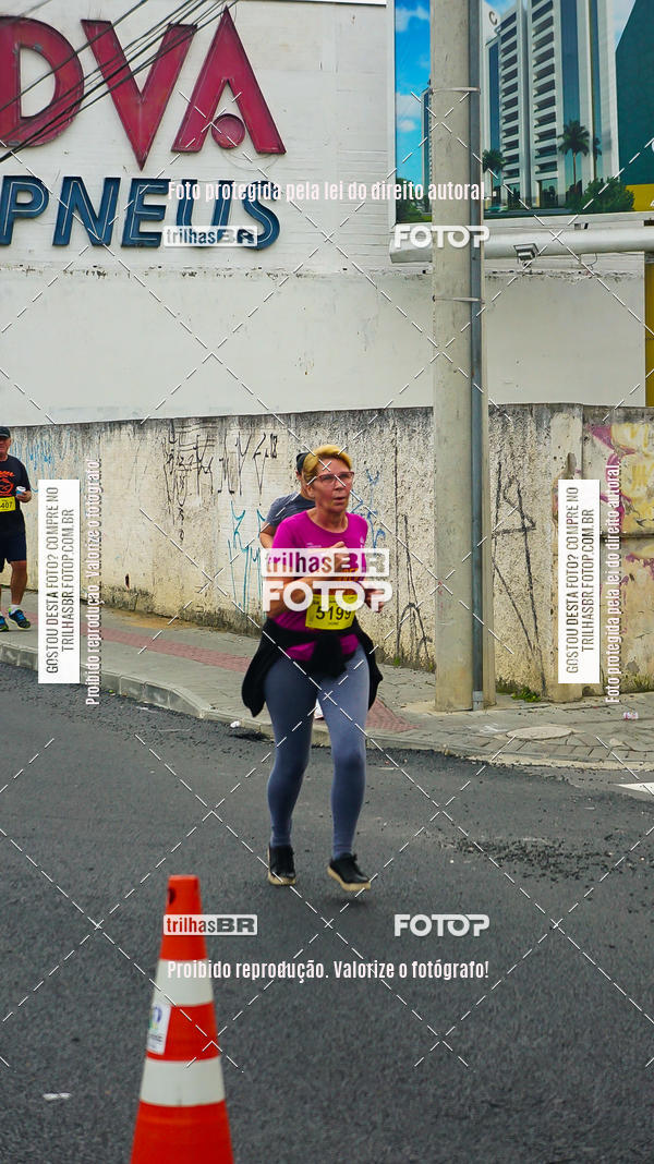 Buy your photos of the eventMeia Maratona de Blumenau on Fotop