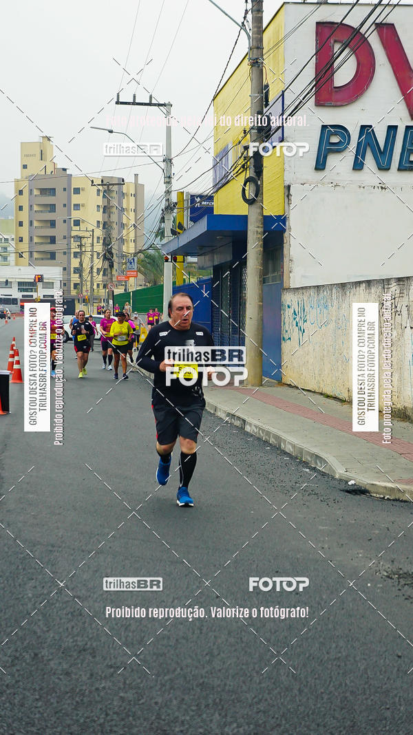 Buy your photos of the eventMeia Maratona de Blumenau on Fotop