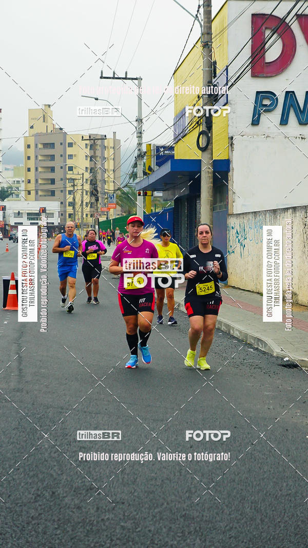 Buy your photos of the eventMeia Maratona de Blumenau on Fotop