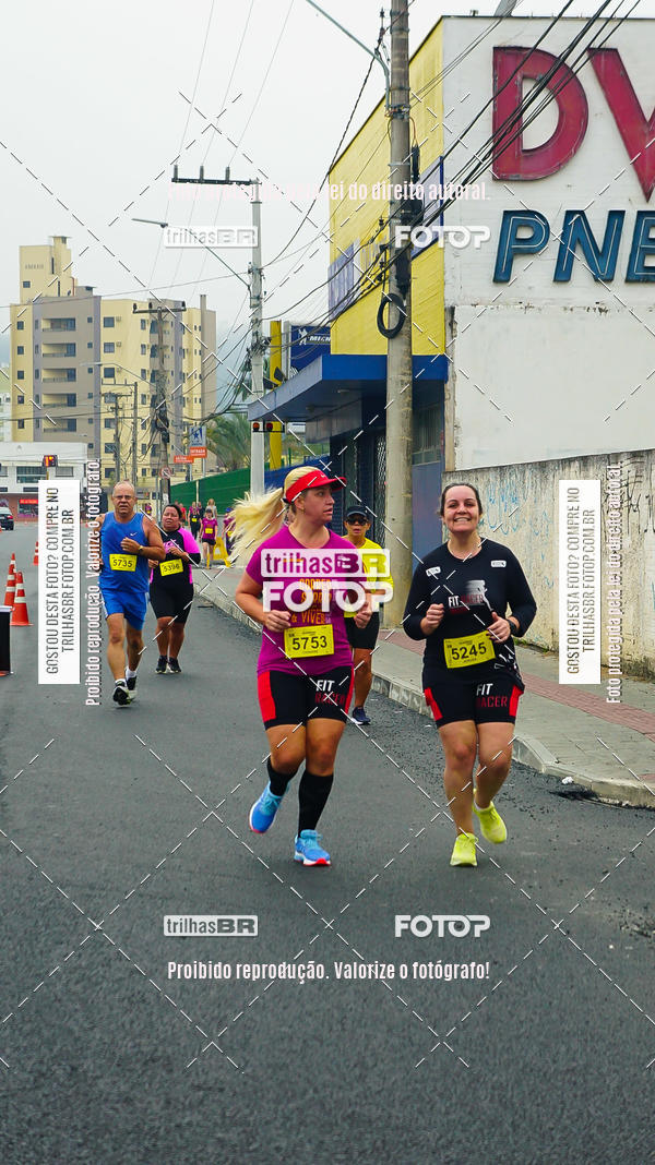 Buy your photos of the eventMeia Maratona de Blumenau on Fotop