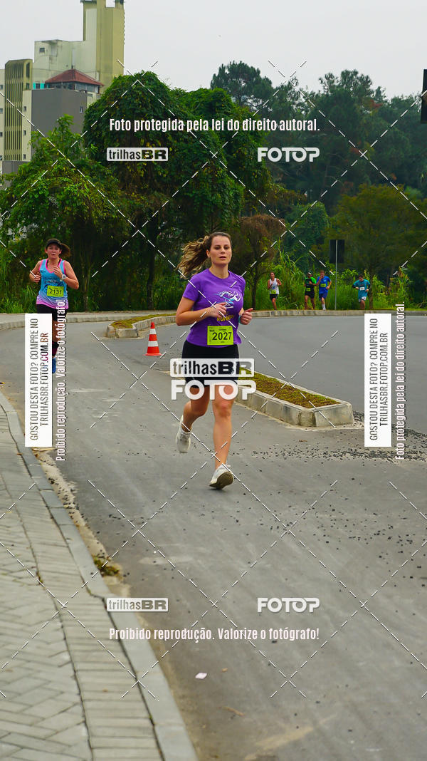 Buy your photos of the eventMeia Maratona de Blumenau on Fotop