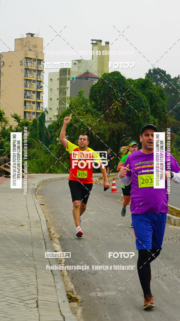 Buy your photos of the eventMeia Maratona de Blumenau on Fotop
